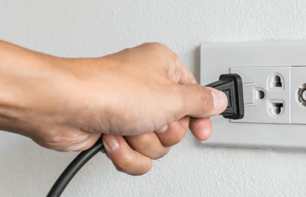 unplug the power cord from the power source