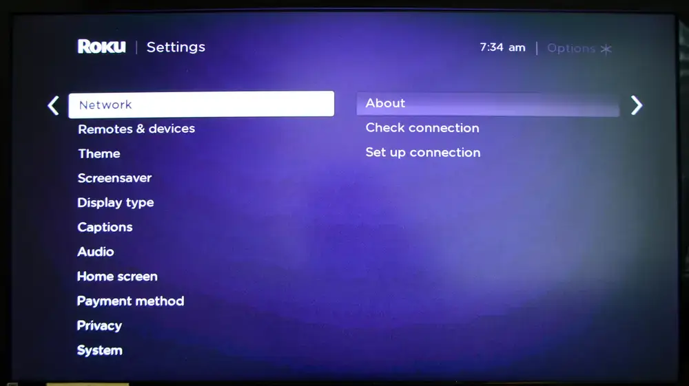 On your Roku TV select Network and About option