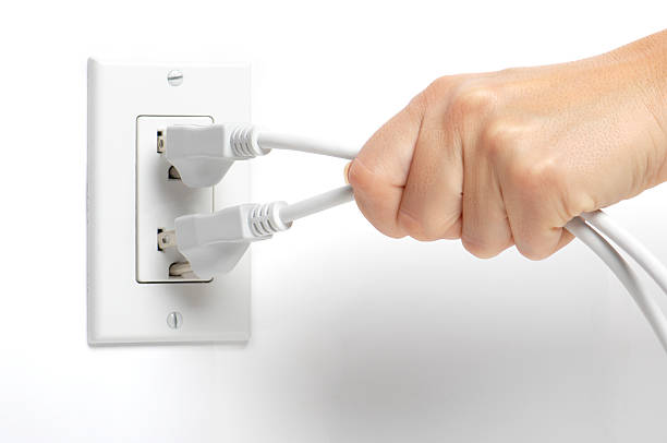 Unplug power cord from wall outlet