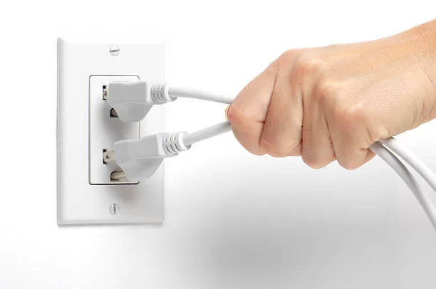 Unplug the power cable from wall outlet