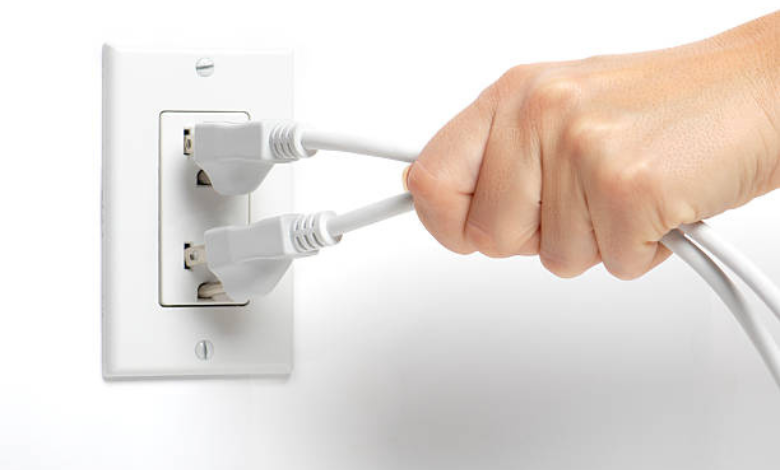Unplug the power cable from the wall  outlet